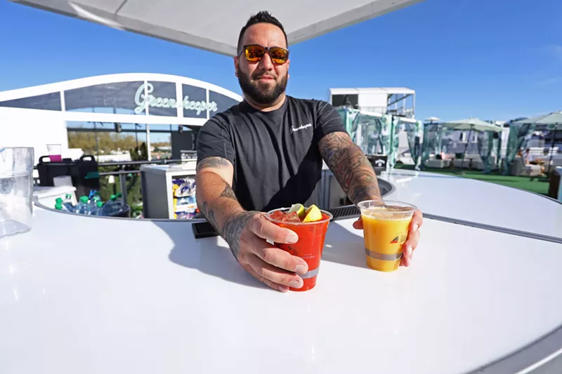 Image: During the week-long golf tournament, chefs and bartenders keep the food and drinks flowing.