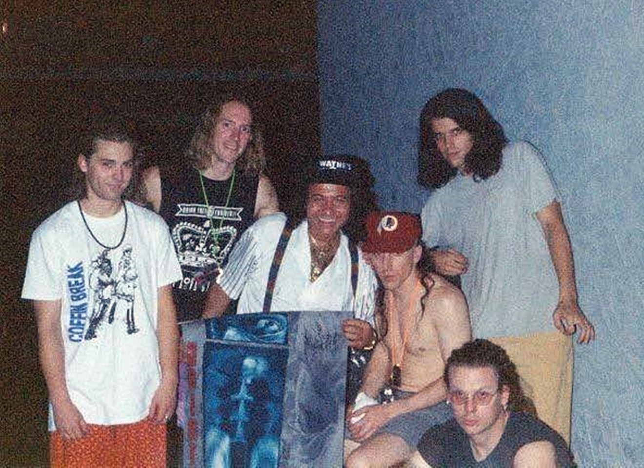 The members of Tool in 1992 outside of The Mason Jar in Phoenix with the venue's then-owner Franco Gagliano (center).
