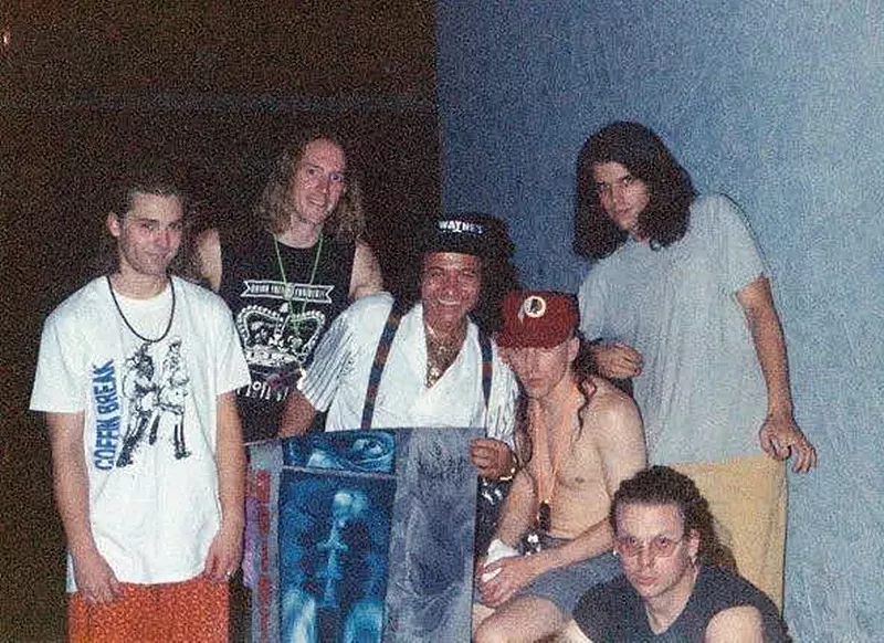 Image: The members of Tool in 1992 outside of The Mason Jar in Phoenix with the venue's then-owner Franco Gagliano (center).