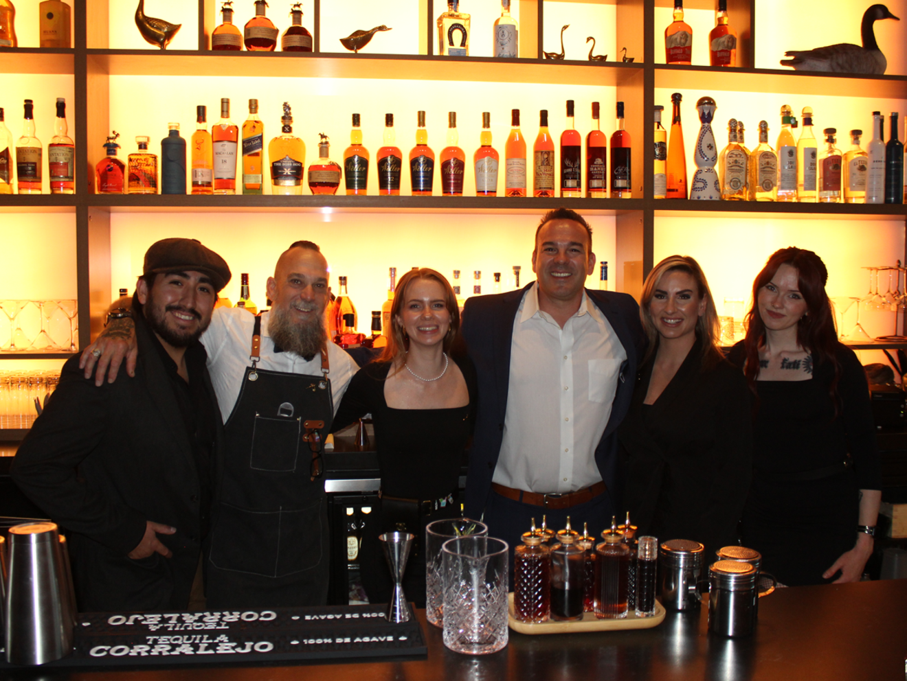 Michael Merendino (third from right) and his team are opening their latest bird-themed bar in Scottsdale on Friday.
