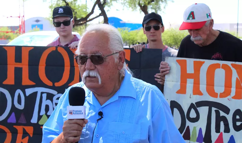 Image: salvador reza at a protest