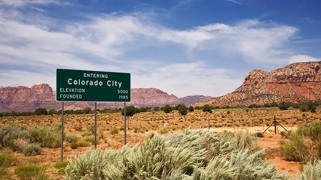 a highway sign for colorado city