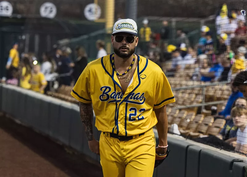 Image: Savannah Banana Austin Krzeminski runs off the field after signing autographs for fans before his game at Camelback Ranch in Glendale on Feb. 6.