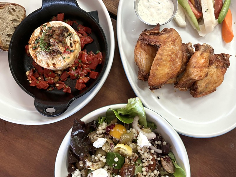 Start your meal at Tesota with Baked Brie, dry-rubbed chicken wings or the Greek Grain salad.