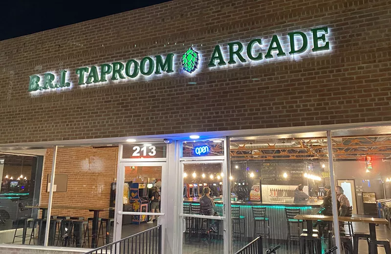 Image: The exterior of B.R.I. Taproom & Arcade along Main Street in Mesa.