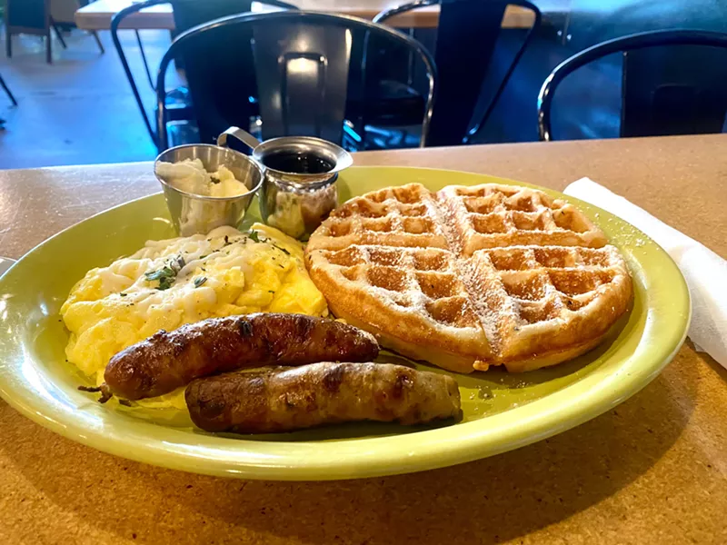 Image: The Pawtucket West comes with two eggs your way, a waffle or two pancakes, and a choice between applewood smoked bacon, Schreiner's pork sausage, or turkey links.