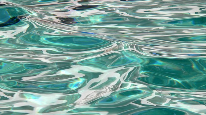 The water in a swimming pool.