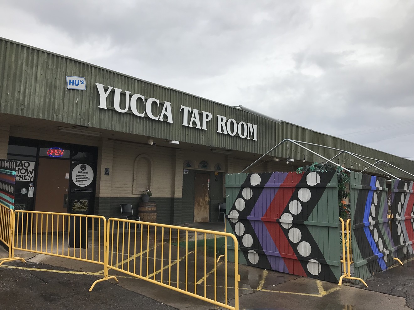 Entrance to Yucca Tap Room, with art by Kyllan Maney, at Danelle Plaza.