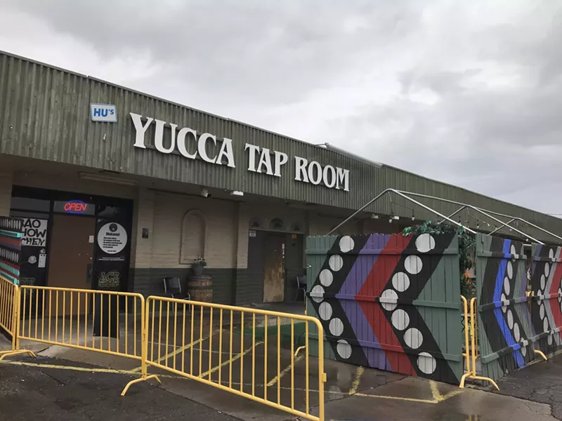 Image: Entrance to Yucca Tap Room, with art by Kyllan Maney, at Danelle Plaza.