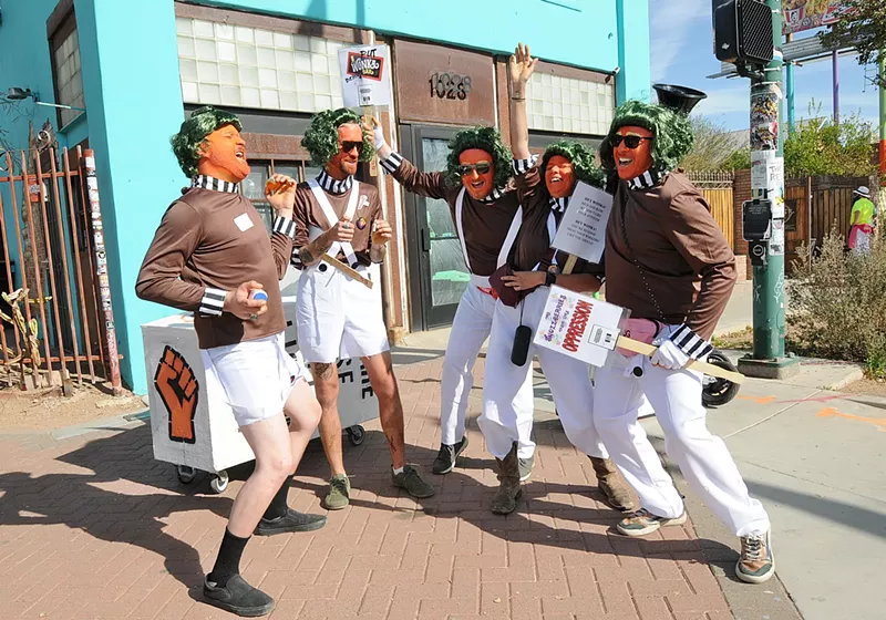 Image: The Oompa Loompas of the "No More Chocolate-Tears" team protest along Grand Avenue during the 2025 Phoenix Idiotarod.