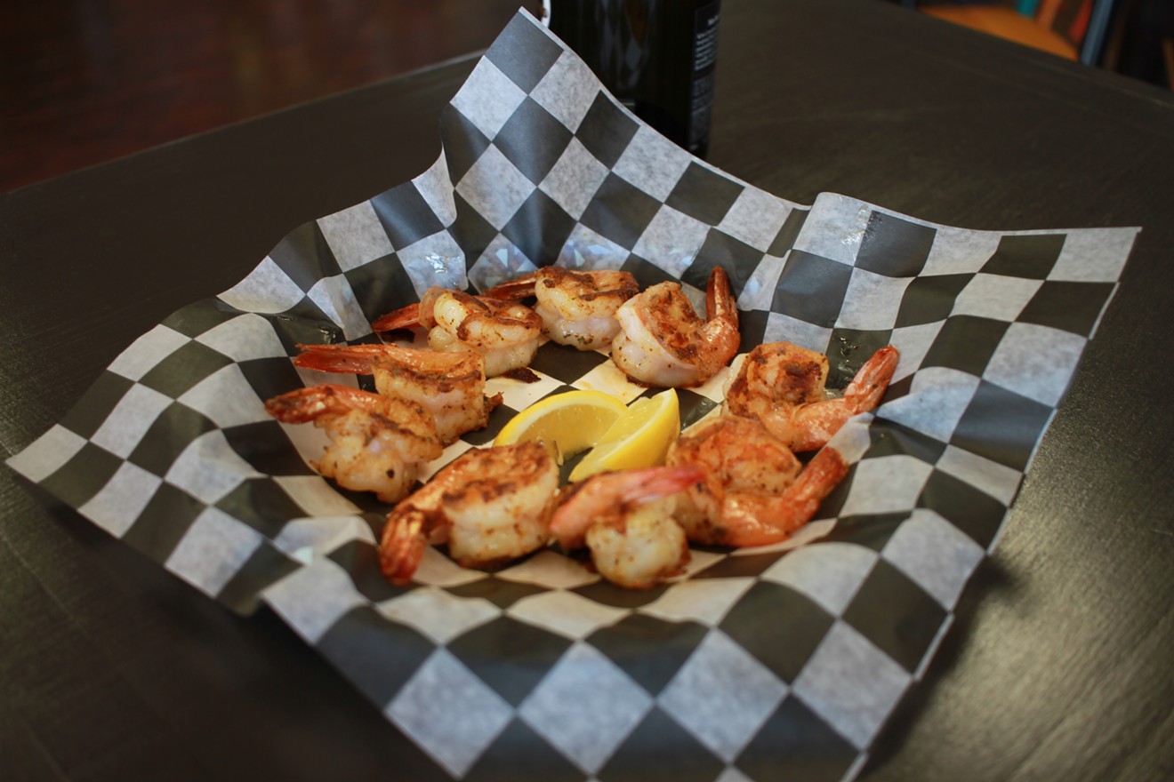 There are a variety of ways to eat seafood at Chesapeake Bay. This shrimp is grilled and drizzled with garlic butter.