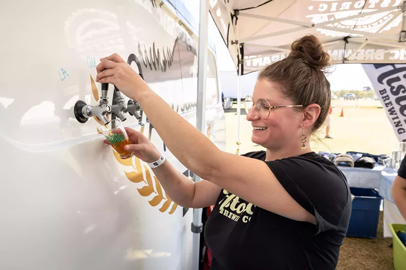 Image: Pouring beer from a trailer.