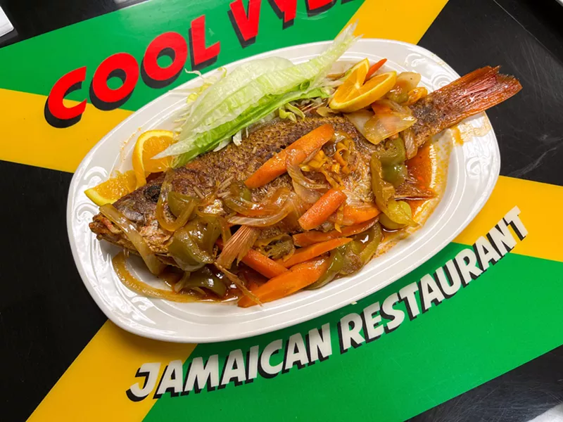 Image: Brown stew fish, deftly fried and smothered with a vibrant sauce, is one of the menu highlights at Cool Vybz.