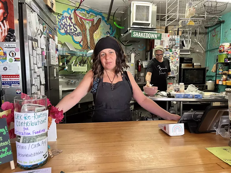 Image: Desert Roots Kitchen owner Leslie Robin at the counter on April 30, the last day of service at the Mill Avenue location she's operated in since 2012.