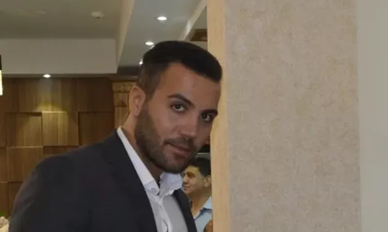 Image: a man in a suit