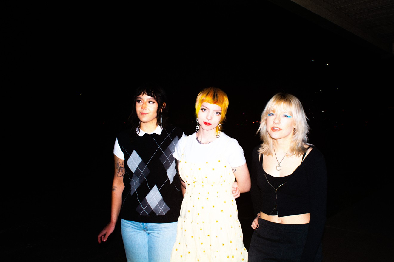 Diva Bleach is, from left, guitarist Sara Windom, vocalist and bassist Sydney Roten, and guitarist Brie Ritter. The DIY music video for their 2023 single "Crawling" released in April, directed by Kira Ramirez.