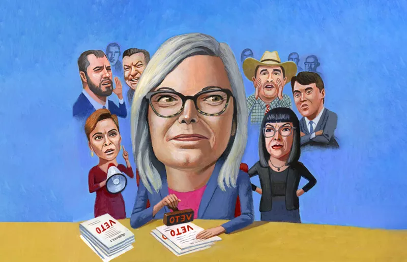 Image: Governor Katie Hobbs surrounded by Republican critics, including (clockwise from bottom left) Kari Lake; Senators Jake Hoffman, Anthony Kern, and Thomas Shope; Turning Point USA co-founder Charlie Kirk; and Senator Justine Wadsack.