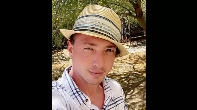 a man in a fedora