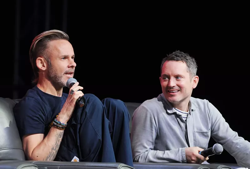 Image: Actors Dominic Monaghan, left, and Elijah Wood during their Phoenix Fan Fusion 2025 panel on Friday.