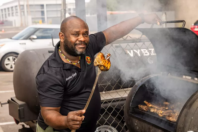 Image: Cool Vybz chef grills chicken.