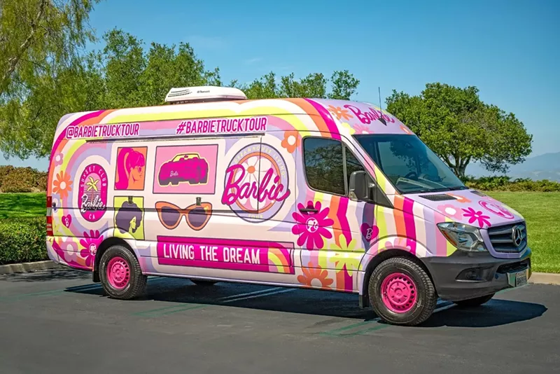 Image: A colorful van with the word Barbie on it.