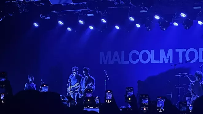 Band performs on stage