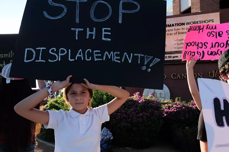 Image: Residents of the Periwinkle Mobile Home Park protested in September over Grand Canyon University's plans to evict them.