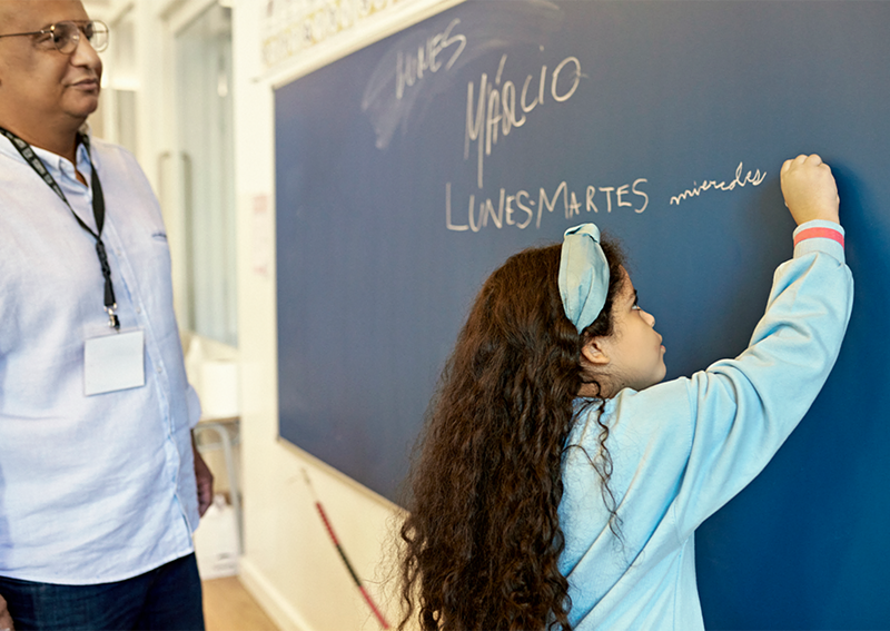 Image: Opponents of dual language models say that they hinder the progress of students learning English.