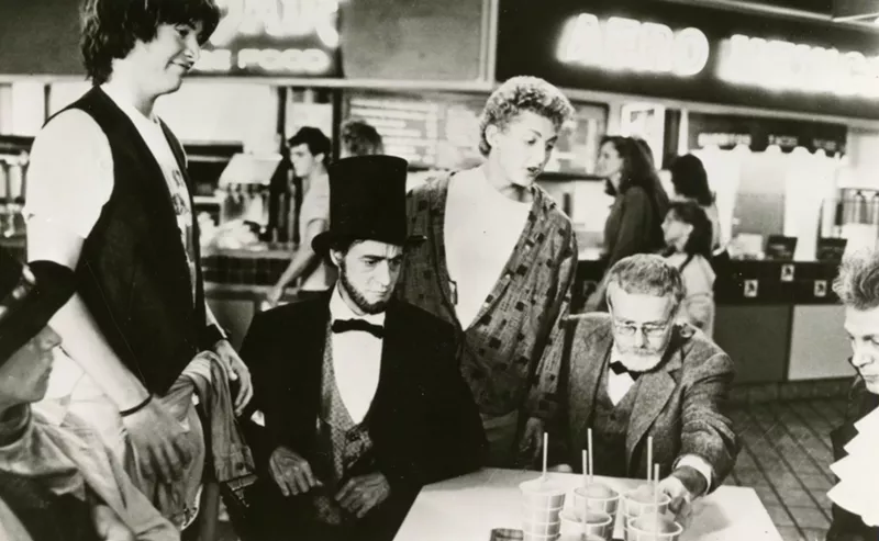 Image: Actors Keanu Reeves, Robert V. Barron, Alex Winter, Rod Loomis, and Clifford David filming in Metrocenter's food court.