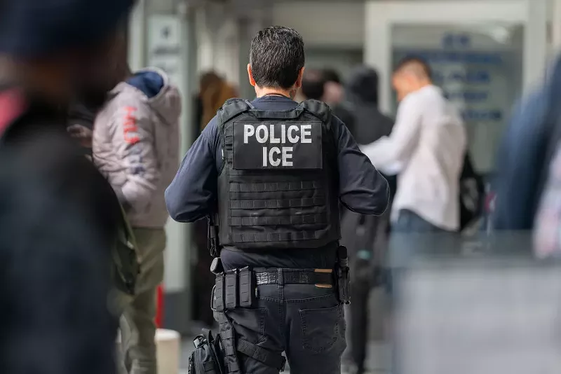 Image: an ICE agent