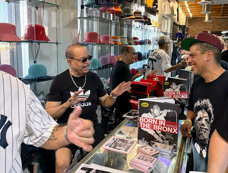 Image: Ice T (left) talking with a fan at Trill in July