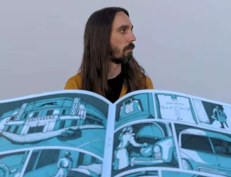 Image: Artist-writer-musician Paul Balazs poses with his book Hazel.
