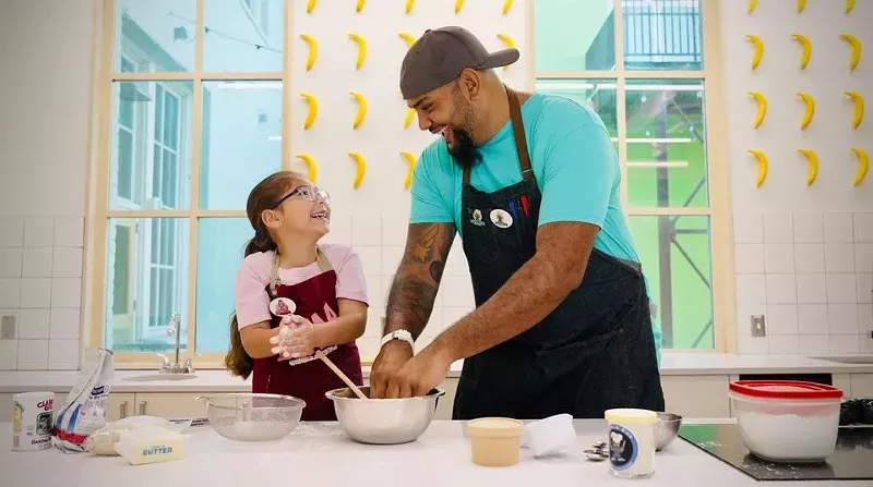 Image: "Edible Ed" Cunje and his daughter, Emma, in the KIDchen at Children's Museum of Phoenix.