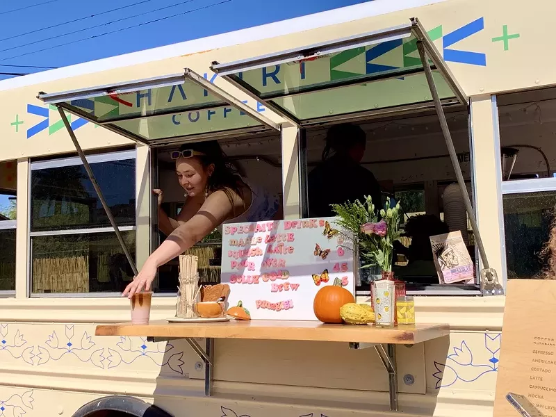 Image: The Hakirí Coffee bus is in the back of the Palabras Bilingual Bookstore.