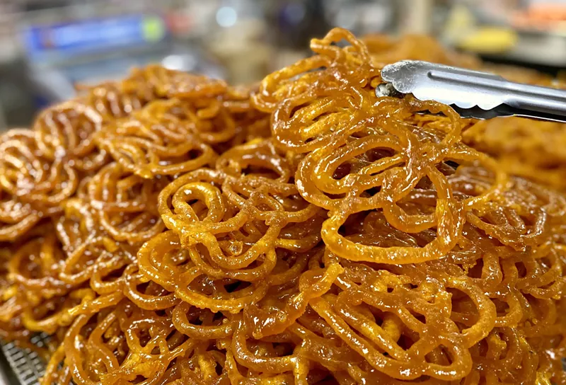 Image: Jalebis are sold by the pound at New India Bazaar.