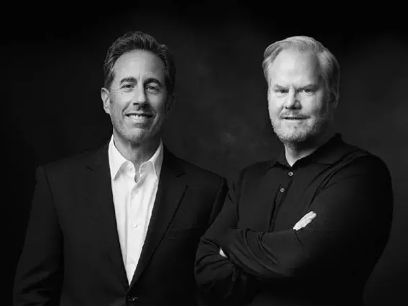 Image: Two middle-aged white men photographed in black and white.