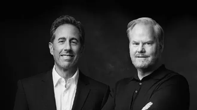 Two middle-aged white men photographed in black and white.