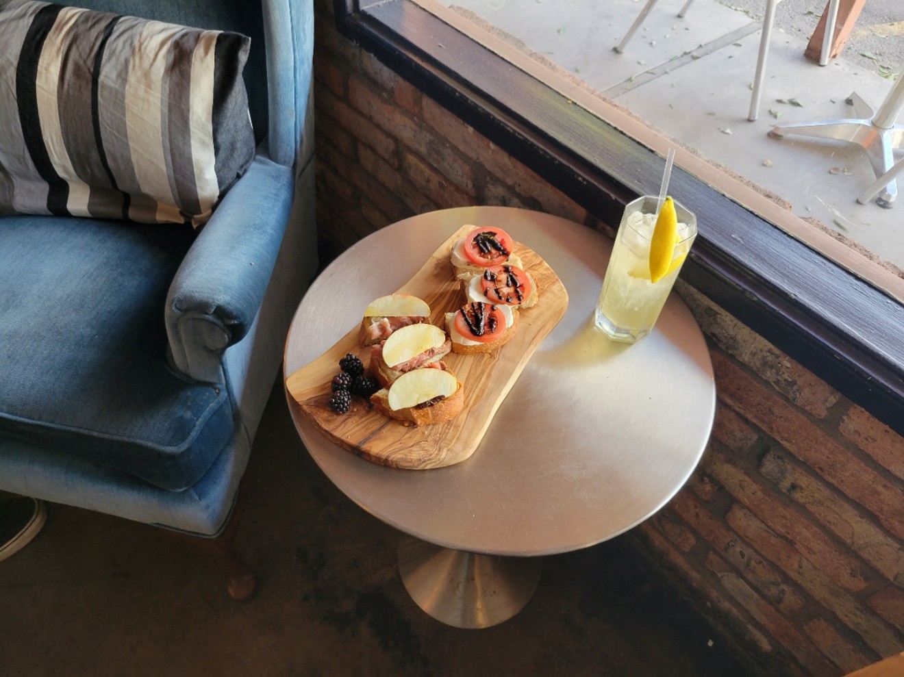 The Lounge at King Coffee serves cocktails and small plates, offering a "chill party vibe" that can be an alternative to the rowdy Mill Avenue bar scene in Tempe.