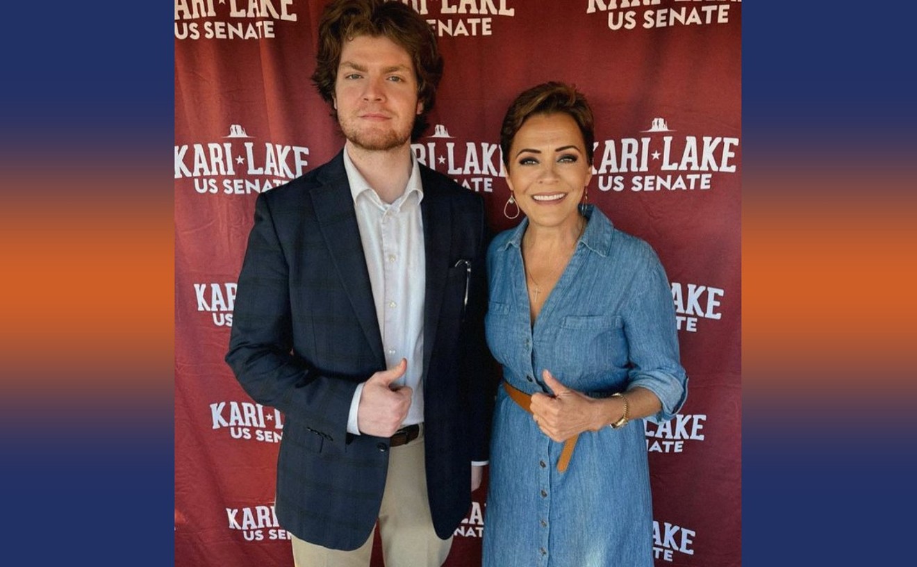 Kari Lake hugs it out with white nationalist during campaign event