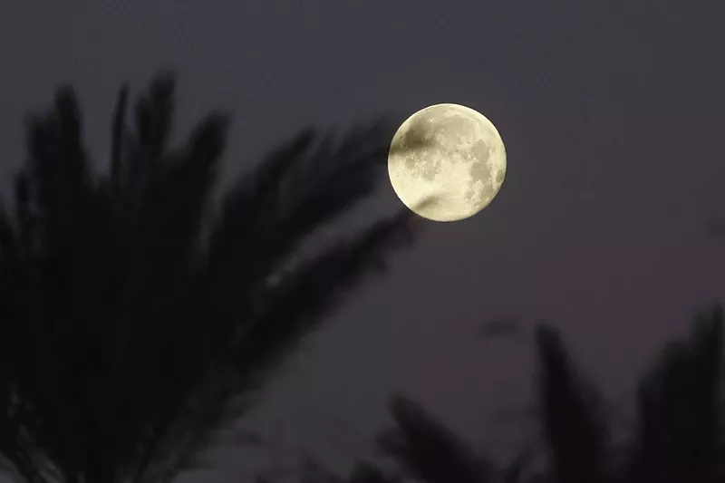 Image: A photo of the full moon over Tucson in spring 2023.