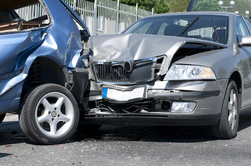 Image: two cars that have crashed into each other