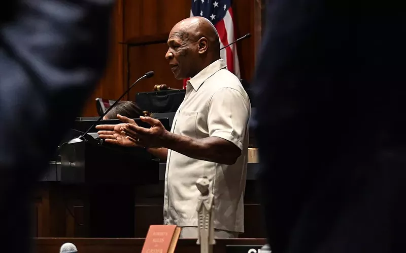 Image: Boxing legend Mike Tyson addresses youth from Phoenix-area Boys and Girls Clubs at the Arizona State Capitol on June 5, 2025.