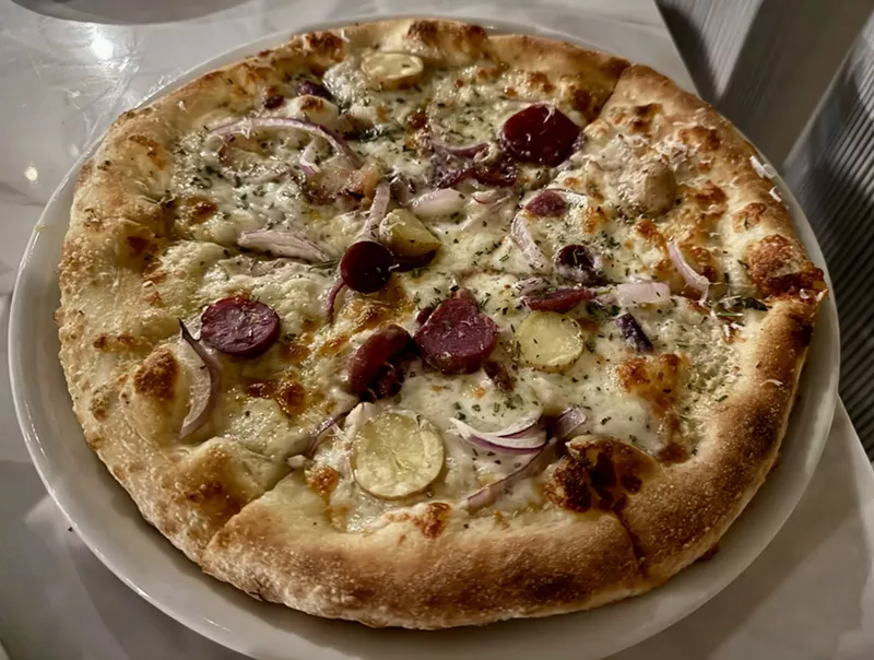 Image: George & Gather's pizzas, like the Rosemary Potato, have a sourdough crust. The new restaurant has become an instant neighborhood destination in Chandler.