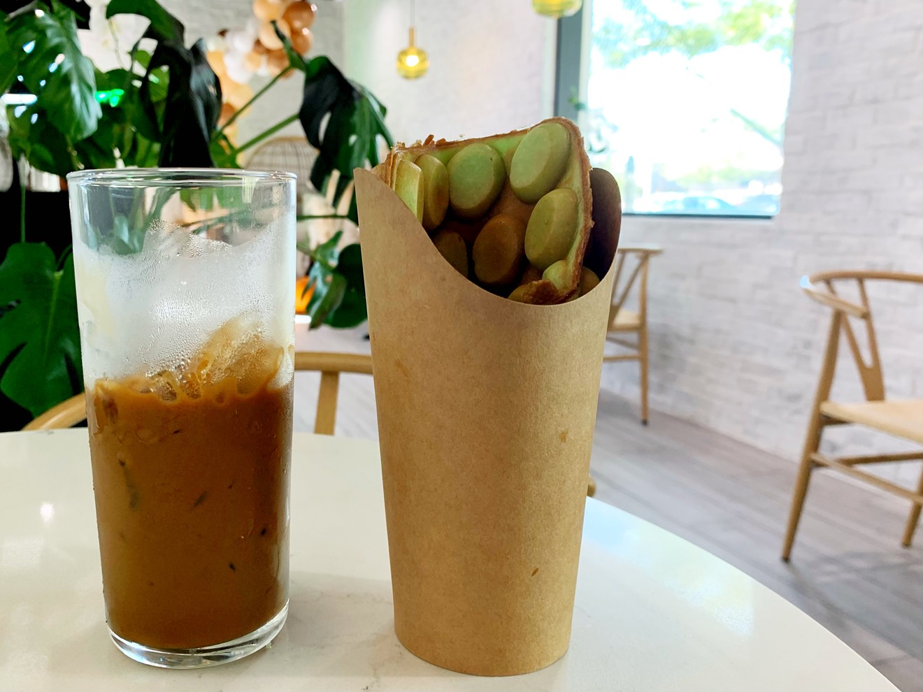 Uptown's Cafe Mollie offers distinctive treats like Vietnamese coffee and pandan waffles.