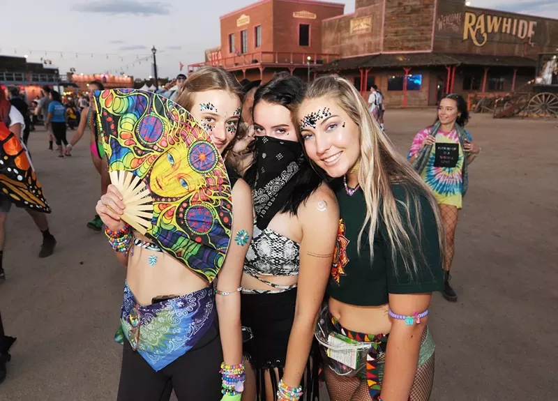 Image: Attendees of the Relentless Beats-promoted Goldrush festival at Rawhide in Chandler.