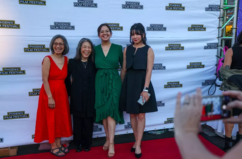 Image: From left, Nina Newell, Cindy Lee, Phoebe Newell and Kat Aparicio pose for a photo during the Phoenix Film Festival’s opening night in Scottsdale on April 4, 2024. Lee’s film “The Stories They Didn’t Tell Us – Nina’s Story,” which recounts Nina Newell’s experiences as a refugee in Vietnam, premiered Thursday at the festival.