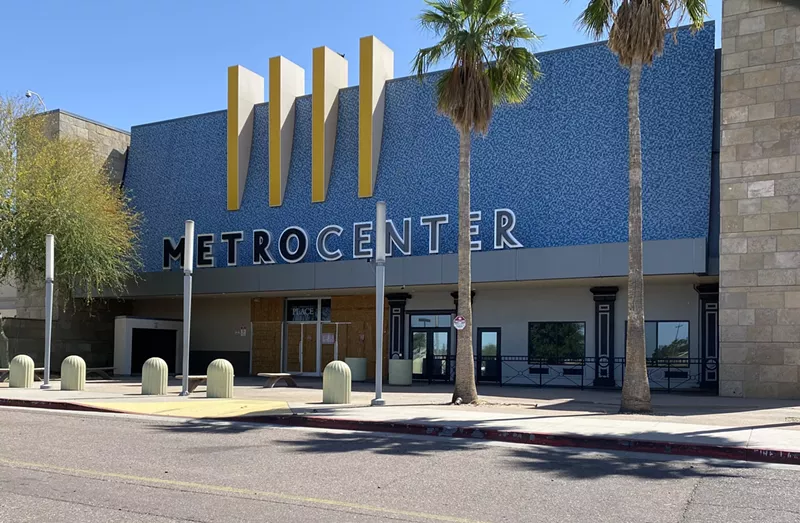 Image: The exterior entrance to a permanently closed mall.