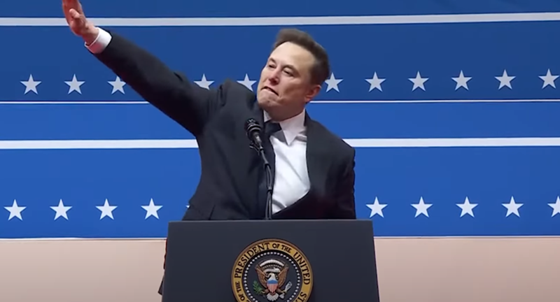 Image: elon musk doing what appears to clearly be a nazi salute