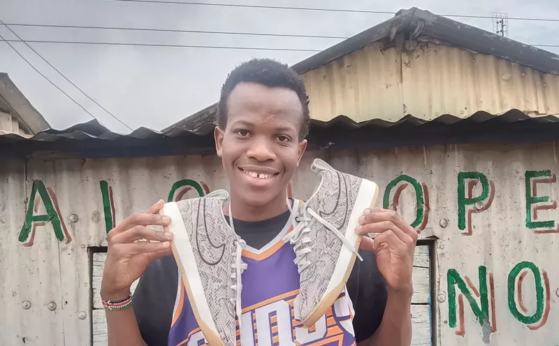 Image: Phoenix Suns gear and connection bring joy to Kenyan superfan