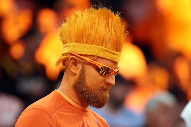 Patrick Battillo, known as Mr. ORNG, at a playoff game between the Phoenix Suns and Denver Nuggets at Footprint Center on May 11, 2023. Peoria police arrested Battillo on April 9.